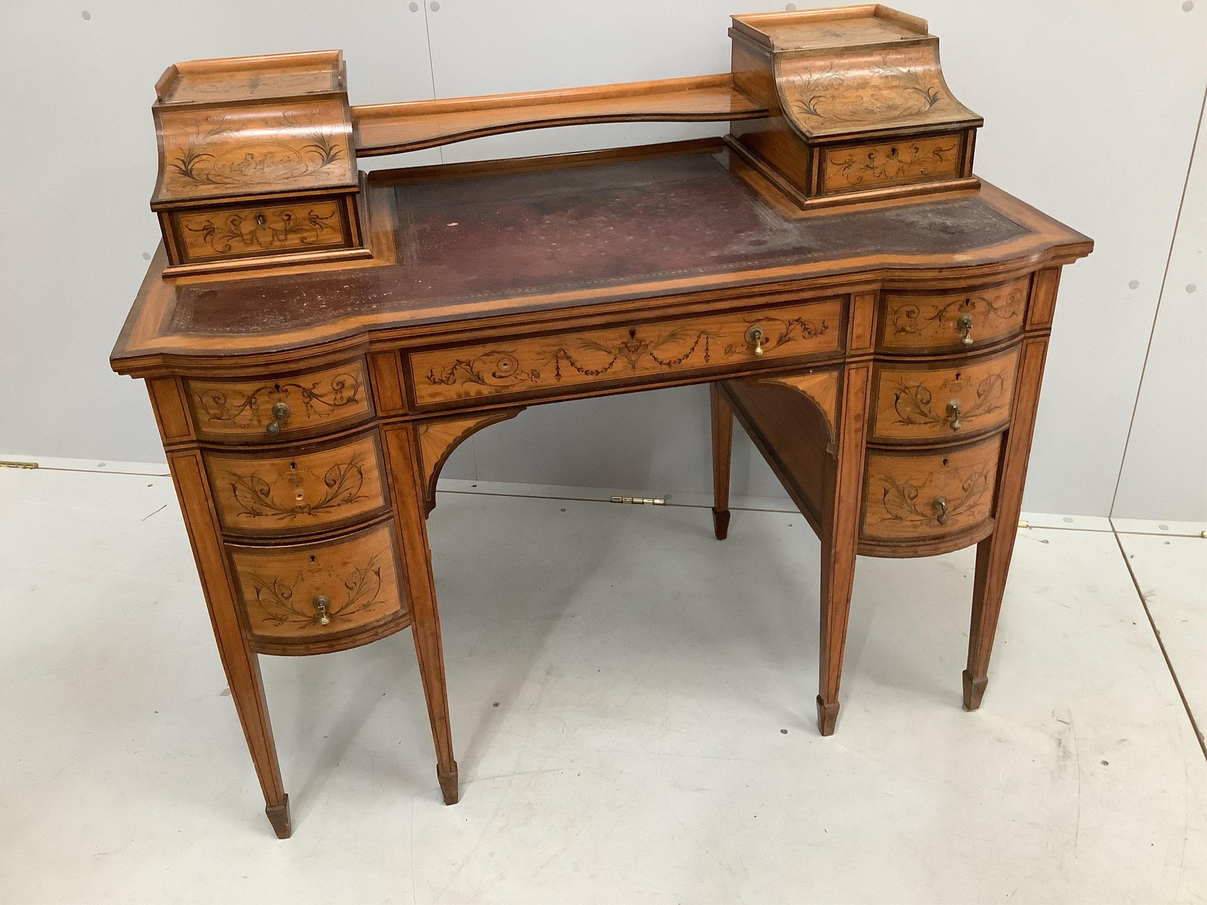 An Edwardian marquetry inlaid Sheraton Revival satinwood kneehole desk, width 106cm, depth 60cm, height 90cm